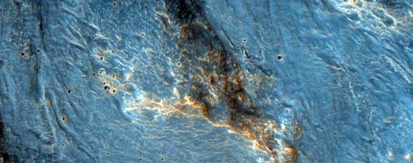 Flow Feature Associated with Nearby Well-Preserved 6-Kilometer Crater
