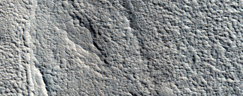 Channel on Margin of Ejecta in Northern Mid-Latitudes
