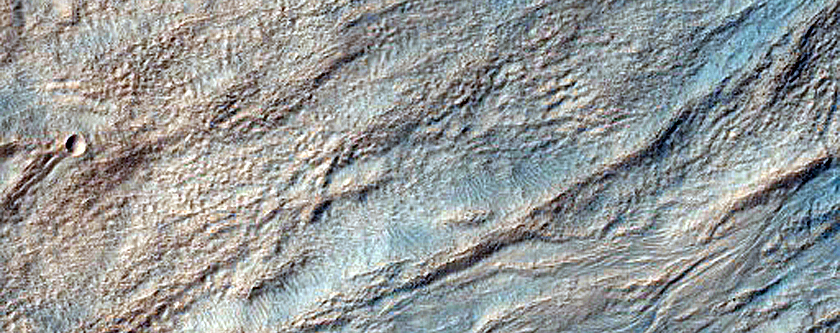 Monitor Gullied Slopes of Impact Crater
