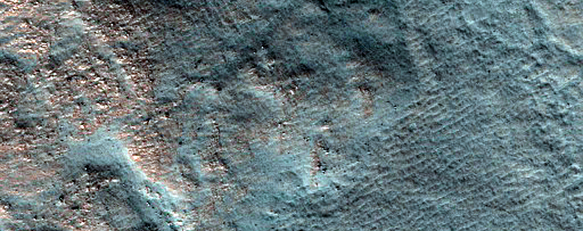 Thermokarst Depressions and Channels in Lyot Crater
