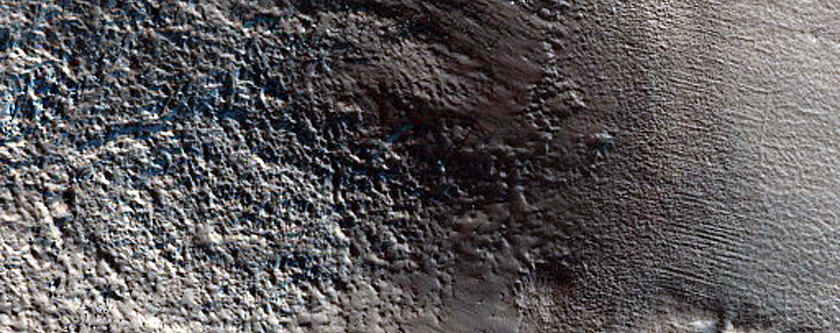 Dipping Layers Near Moreux Crater
