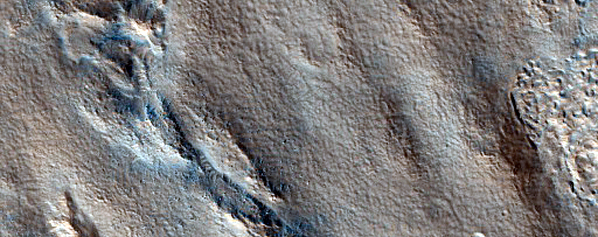 Layered Feature in Crater in Deuteronilus Mensae
