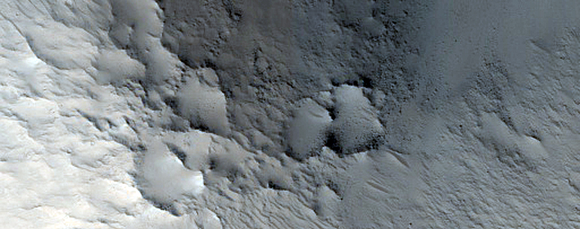 Ejecta and Mound in Northern Mid-Latitudes
