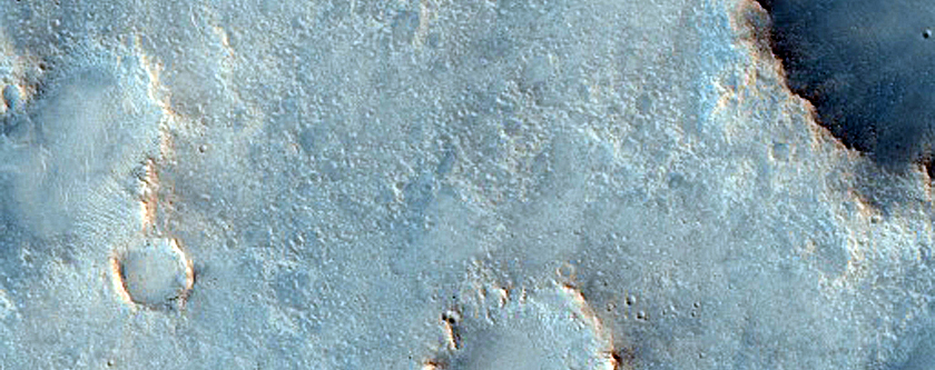 Contributory Channels Over Syrtis Major Lava Flows
