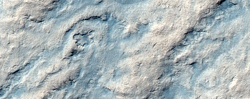 Possible Impact Crater on South Polar Layered Deposits
