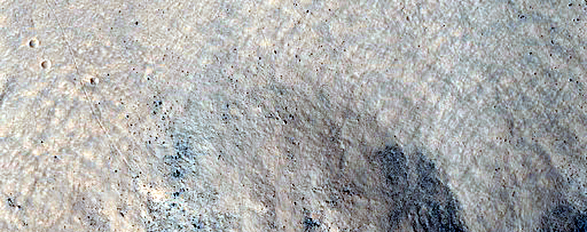 Crater on Rim of Larger Well-Preserved Crater
