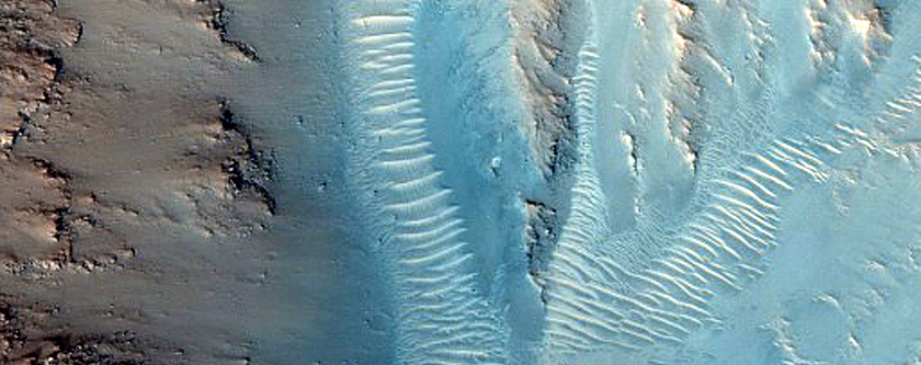 Possible Layers in Crater Wall Near Kasei Valles

