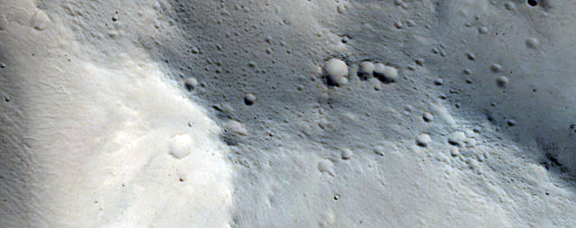Channel Entering Crater in Cydonia Mensae
