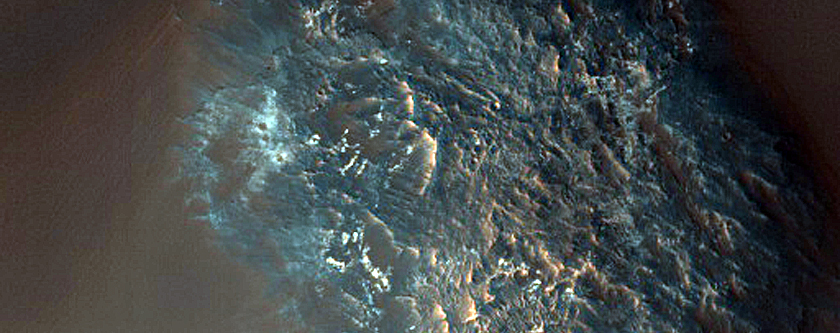 Light-Toned Deposits on Floor of Orson Welles Crater
