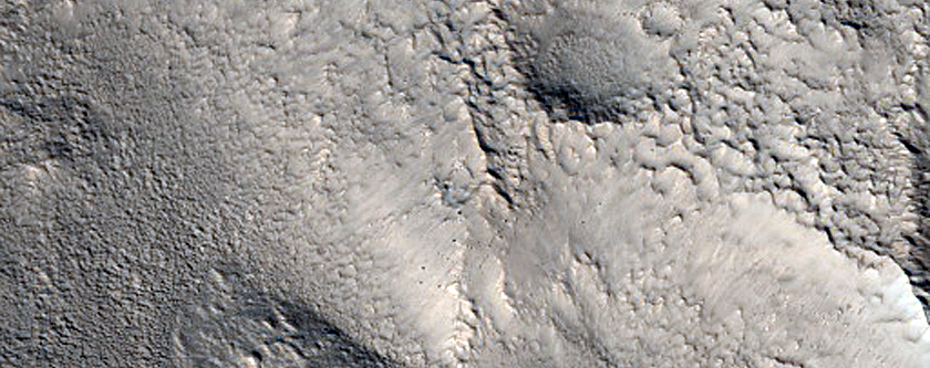 Small Mounds on Rim of Moreux Crater
