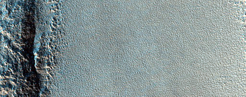 Pits Forming Lines in Protonilus Mensae
