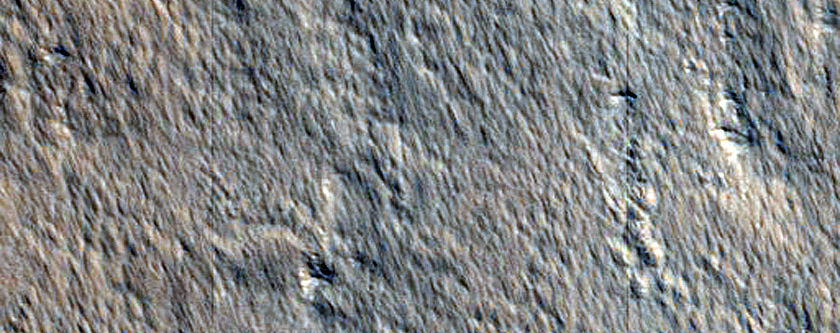 Well-Preserved Ejecta of 20-Kilometer Crater Northeast of Ascraeus Mons
