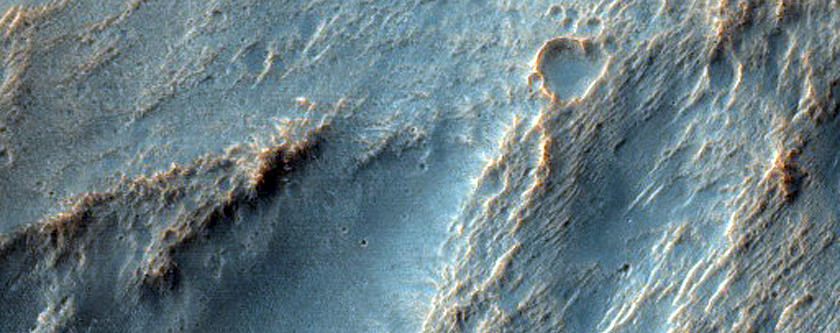 Possible Olivine-Rich Crater Ejecta in Terra Sirenum
