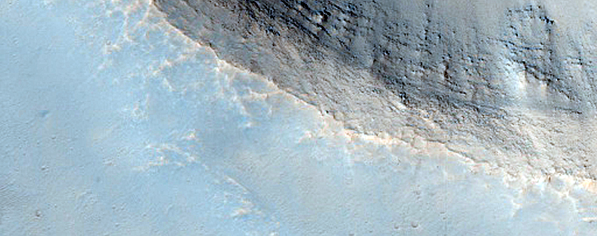 2-Kilometer Diameter Crater South of Ius Chasma
