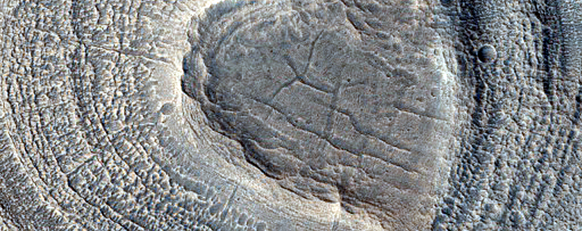 Small Crater with Layered Sedimentary Mound