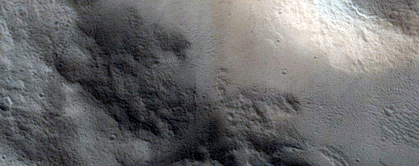 Possible Old Tongue-Shaped Flow on Crater Floor in Acheron Fossae
