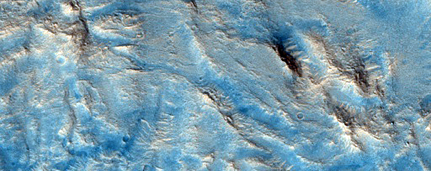 Mound in Crater Ejecta in Northern Mid-Latitudes
