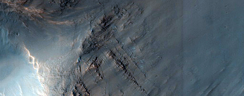 Possible Exit Breaches in Crater with Preserved Ejecta Texture
