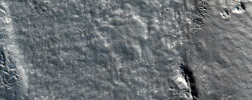 Fractured Deposit in Crater in Northwest Tempe Terra
