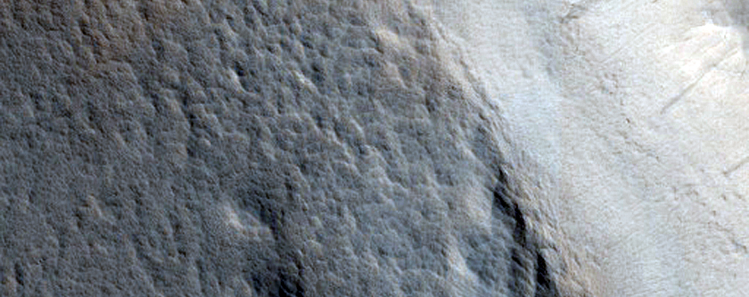 Slope Streaks in Crater Near Zephyrus Fossae
