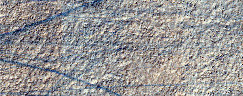 Layered Deposit in Small Crater in Hellas Planitia
