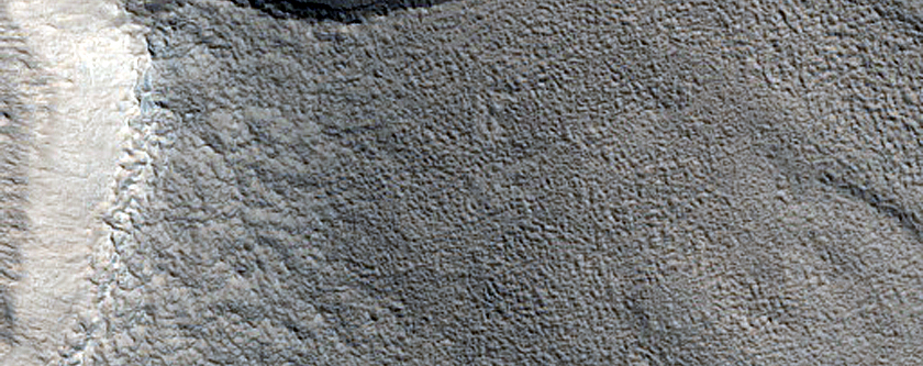 Channels on Crater Rim in Northern Mid-Latitudes
