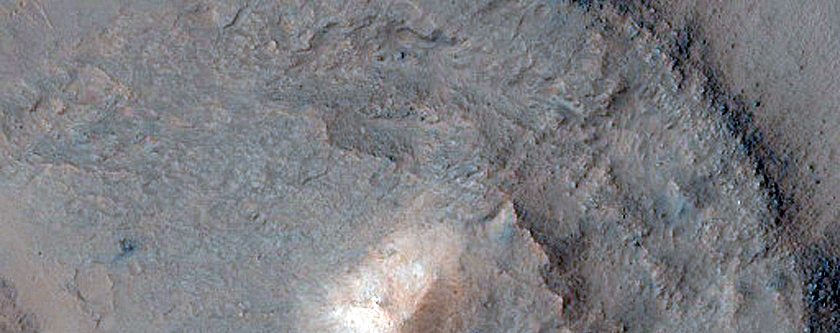 Mounds and Fractures in Eos Chasma