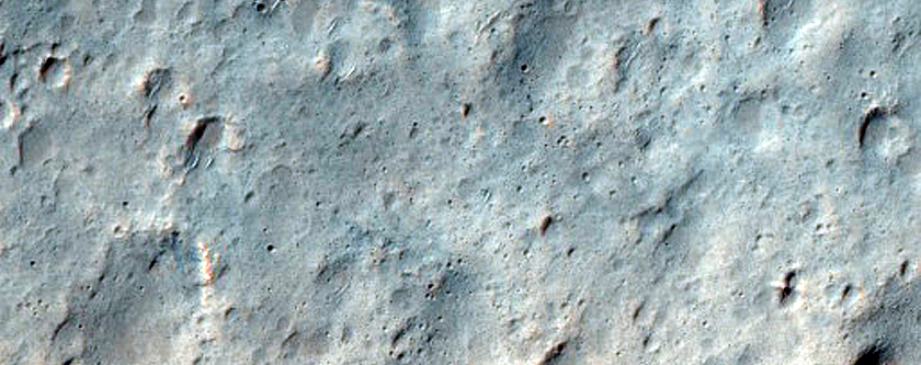 Channels and Sinuous Ridges in Terra Cimmeria
