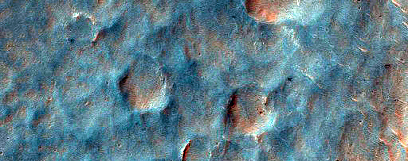 Polyphase Exit Breach in Small Crater on East Rim of Holden Crater
