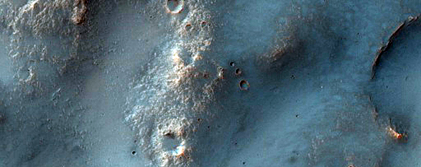 Channels at Possible Ejecta Contacts at Bakhuysen Crater
