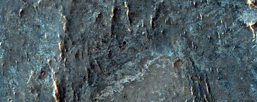 Olivine-Rich Crater Ejecta in Thaumasia Planum
