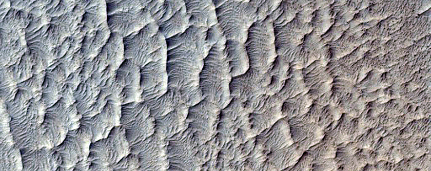 Eroded Impact Crater on Hellas Planitia Floor
