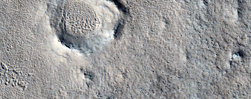 Dipping Layers in Craters in Northern Mid-Latitudes
