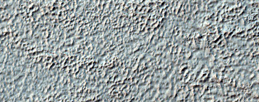 Fan and Scarp on Crater Floor in Aonia Terra