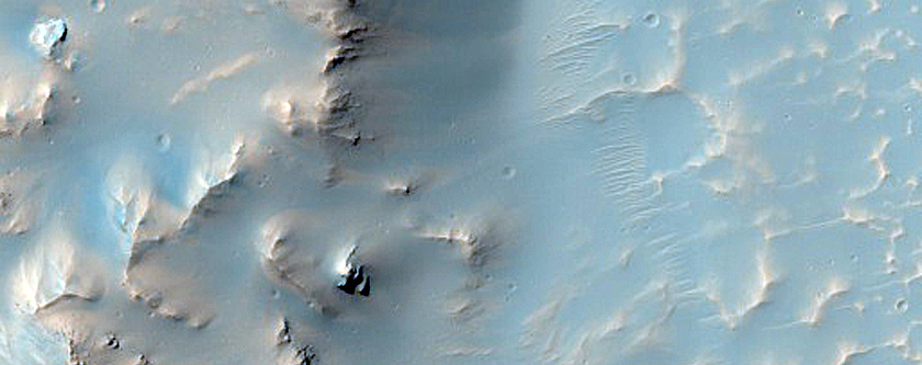 Western Rim and Ejecta of Well-Preserved Impact Crater
