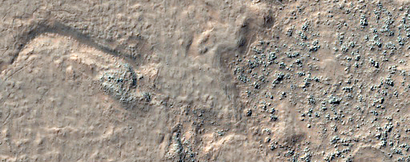 Ridge-Forming Unit Overlying Dark Curved Unit South of Greeley Crater
