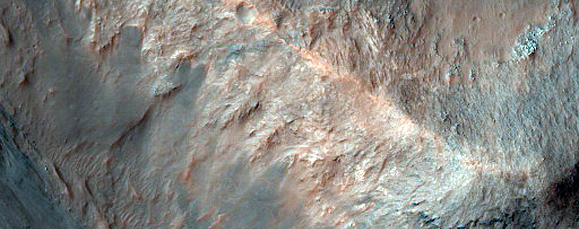 Lighter-Toned Spur or Ridge in Western Juventae Chasma Wall
