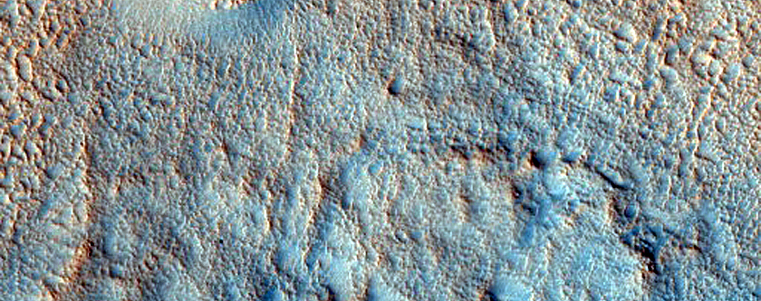 Layered Deposit in Small Northern Mid-Latitude Crater
