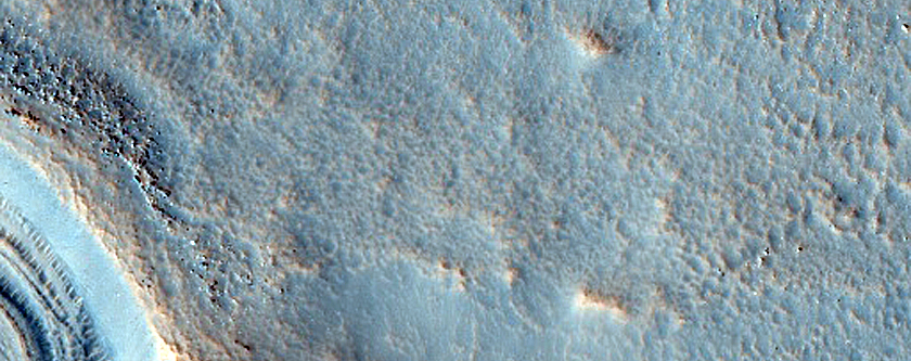 Tilted Layers in Crater Near Renaudot Crater

