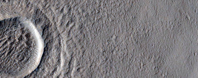 Crater in Pavonis Mons Aureole
