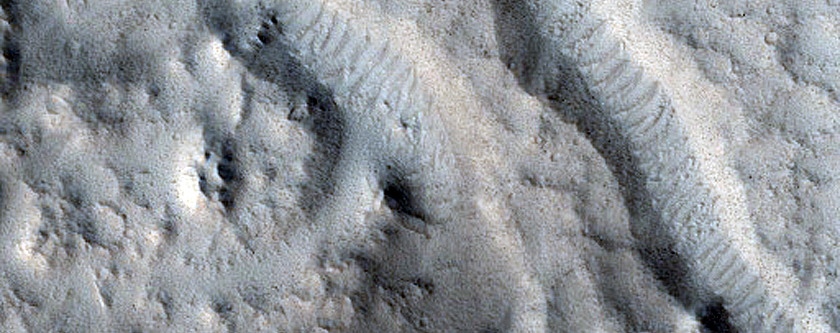 Valleys in Crater North of Sacra Sulci