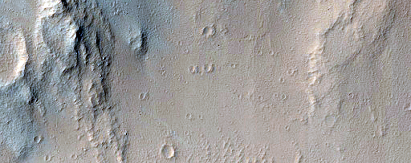 Lava Flow Entering Impact Crater North of Echus Chasma