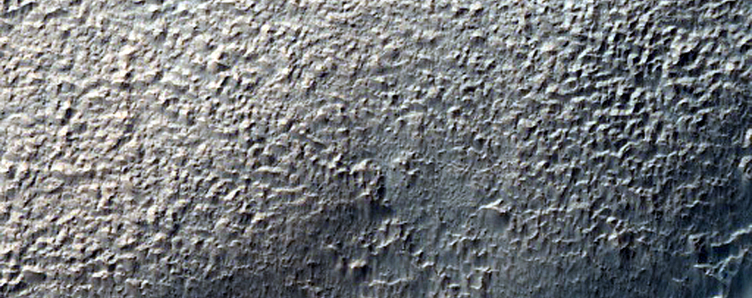 Small Channels Converging above Large Crater