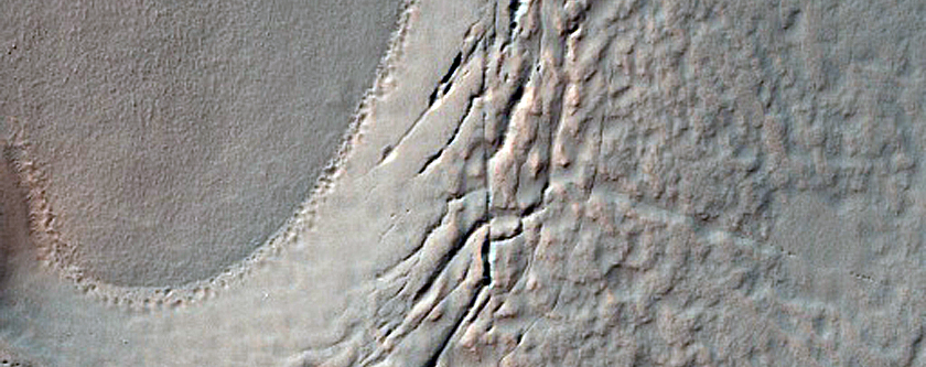 Crater Filled with Lobate Mantling Deposits and Ridges