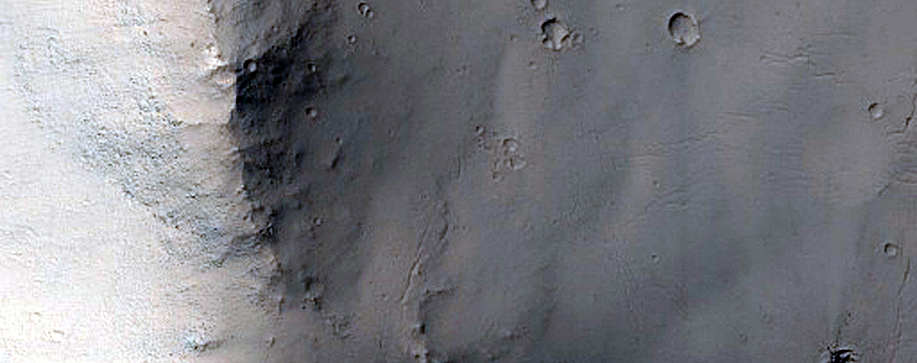 Material in Crater on South Rim of Ius Chasma