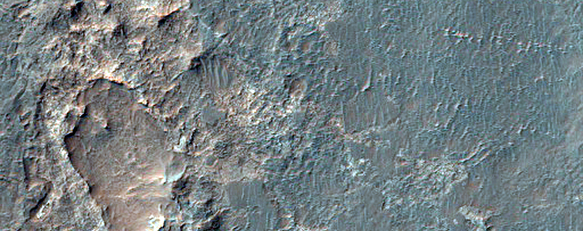 Contact between Crater Ejecta and Altered Floor in Ladon Valles Basin