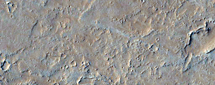 Discontinuous Channel Near Olympica Fossae