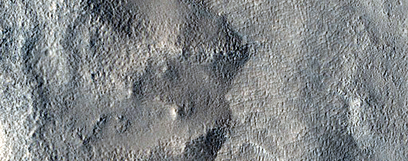 Layered Mesa in Crater South of Semeykin Crater