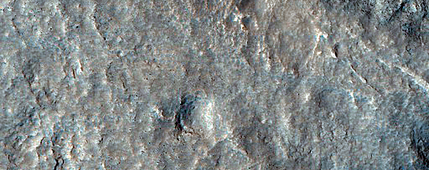 Dipping Layers in Crater Near Mamers Valles