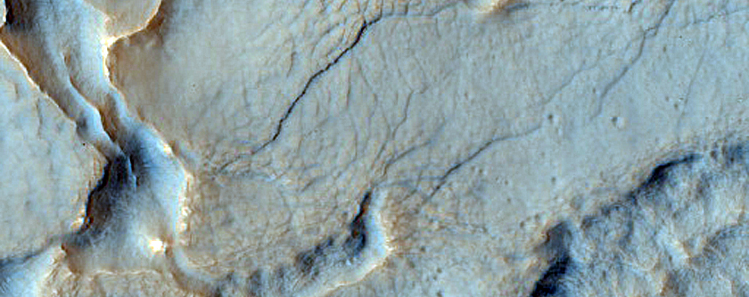 Ridge and Trough Terrain among Mesas in Deuteronilus Mensae